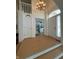 Spacious foyer with staircase and view into the living space at 10404 Trillium Ct, Noblesville, IN 46060