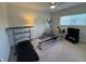 Carpeted exercise room with an elliptical, rower, treadmill, and TV at 10404 Trillium Ct, Noblesville, IN 46060