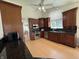 Contemporary kitchen featuring dark cabinets, stainless appliances, and granite countertops at 10404 Trillium Ct, Noblesville, IN 46060