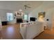 Bright living room with fireplace, hardwood floors and large windows at 10404 Trillium Ct, Noblesville, IN 46060
