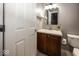 Charming bathroom featuring a dark wood vanity and a framed mirror at 11648 Stickney Ct, Fishers, IN 46037