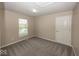 Bedroom with a window and neutral walls and carpeting at 11648 Stickney Ct, Fishers, IN 46037