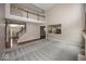 Spacious living room with soaring ceilings, large picture window to kitchen and dining area at 11648 Stickney Ct, Fishers, IN 46037