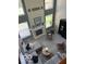 High angle view of spacious living room with fireplace, ample seating, and many windows at 11648 Stickney Ct, Fishers, IN 46037