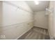 Walk-in closet with installed shelving and neutral carpeting at 11648 Stickney Ct, Fishers, IN 46037