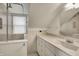 Bathroom with white marbled counter and bathtub with shower at 1194 S Faculty Dr, Indianapolis, IN 46241