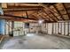 Garage featuring built-in cabinets and concrete flooring, providing ample storage space at 1194 S Faculty Dr, Indianapolis, IN 46241