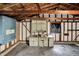 Garage interior featuring unfinished walls, a work area and ample storage space at 1194 S Faculty Dr, Indianapolis, IN 46241