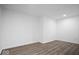 Finished basement with recessed lights and wood look flooring at 1243 Colinbrook Cir, Greenwood, IN 46143