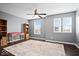 Bright bedroom with a ceiling fan, neutral walls, and large windows offering plenty of natural light at 1243 Colinbrook Cir, Greenwood, IN 46143