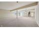 Spacious basement offers ample room for customization with neutral carpet and lighting at 12907 Shiraz Ln, Fishers, IN 46037