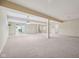 Large basement with open layout, neutral carpet, and support beams for flexible design at 12907 Shiraz Ln, Fishers, IN 46037