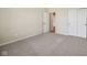 A cozy bedroom offers a closet and neutral-colored walls to make decorating a breeze at 12907 Shiraz Ln, Fishers, IN 46037