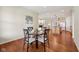 The dining area offers wood floors and a seamless transition to the kitchen and living room at 12907 Shiraz Ln, Fishers, IN 46037