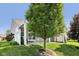 Home with a covered patio and views of trees and grass at 12907 Shiraz Ln, Fishers, IN 46037