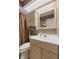 Standard bathroom with vanity with white sink and shower with curtain at 13892 Adios Pass, Carmel, IN 46032