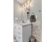 Bathroom featuring an elegant vanity with a marble countertop and modern fixtures at 13892 Adios Pass, Carmel, IN 46032