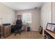 Neutral bedroom, featuring a desk with rolling chair and a side table at 13892 Adios Pass, Carmel, IN 46032