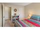 Comfortable bedroom featuring neutral walls, plush carpet, and stylish decor at 13892 Adios Pass, Carmel, IN 46032
