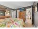 Bedroom featuring carpet, closet space, and an adjacent ensuite bathroom at 13892 Adios Pass, Carmel, IN 46032
