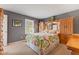 Comfortable bedroom with carpet, closet space, and ample natural light at 13892 Adios Pass, Carmel, IN 46032