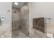 Modern shower with glass door, neutral tile, and a luxurious shower head at 13892 Adios Pass, Carmel, IN 46032