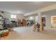 Spacious carpeted basement featuring a treadmill, recessed lighting, and potential for flexible use at 14910 Declaration Dr, Westfield, IN 46074