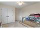 Bedroom features a ceiling fan and double door closet for easy storage at 14910 Declaration Dr, Westfield, IN 46074