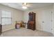 Inviting bedroom with a ceiling fan, a secretary desk, and natural light streaming through the window at 14910 Declaration Dr, Westfield, IN 46074