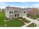 Beautiful two-story home with a well-manicured lawn, complemented by a two-car garage and lovely landscaping at 14910 Declaration Dr, Westfield, IN 46074