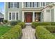 Charming home exterior with a beautiful front door, inviting walkway, and manicured landscaping at 14910 Declaration Dr, Westfield, IN 46074