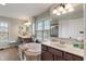 Luxurious main bathroom with soaking tub, double vanities, and abundant natural light at 14910 Declaration Dr, Westfield, IN 46074