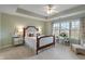 Serene main bedroom features a tray ceiling, plush bedding, and mirrored nightstands at 14910 Declaration Dr, Westfield, IN 46074