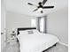 Inviting bedroom with a comfortable bed, ceiling fan, and cozy decor at 15341 Montfort Dr, Noblesville, IN 46062