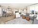 Spacious living area adjoining dining and kitchen, filled with natural light and stylishly furnished for comfortable living at 15341 Montfort Dr, Noblesville, IN 46062