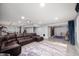 Finished basement with a seating area and plenty of room for entertaining at 15762 Hargray Dr, Noblesville, IN 46062