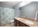 Bathroom featuring a double vanity with granite countertop and framed mirror at 15762 Hargray Dr, Noblesville, IN 46062