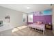 Cozy bedroom featuring a bed, stylish wainscoting, natural light, and neutral carpet at 15762 Hargray Dr, Noblesville, IN 46062