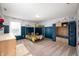 Unique bedroom featuring a bunk bed, football-themed decor, blue lockers, and ample light at 15762 Hargray Dr, Noblesville, IN 46062