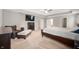 Large main bedroom features a ceiling fan, sitting area, ensuite access, and abundant light at 15762 Hargray Dr, Noblesville, IN 46062