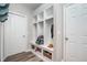 Mudroom with built-in shelving, cubbies, and bench seating, perfect for organization at 15762 Hargray Dr, Noblesville, IN 46062