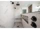 Contemporary shower featuring marble-look tile, rain shower head, and a built-in bench at 15762 Hargray Dr, Noblesville, IN 46062