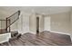 Spacious finished basement features modern vinyl floors, neutral walls and a staircase at 17269 Dallington St, Westfield, IN 46074