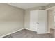 Bedroom with neutral walls, carpet, and a white door leading to other rooms at 17269 Dallington St, Westfield, IN 46074
