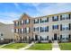 Attractive townhouse exteriors feature a combination of brick and siding, enhancing curb appeal at 17269 Dallington St, Westfield, IN 46074