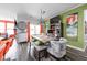 Charming dining space with a large clock feature, colorful curtains and lots of light at 17302 Graley Pl, Westfield, IN 46074