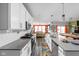 Modern kitchen featuring stainless steel appliances and an open view to the living room at 17302 Graley Pl, Westfield, IN 46074