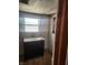 Bathroom with a modern vanity, sink, and window at 1901 S F St, Elwood, IN 46036