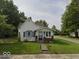 Charming home with a traditional design and a well-maintained front yard at 1901 S F St, Elwood, IN 46036
