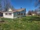 Exterior view of home and yard at 1901 S F St, Elwood, IN 46036